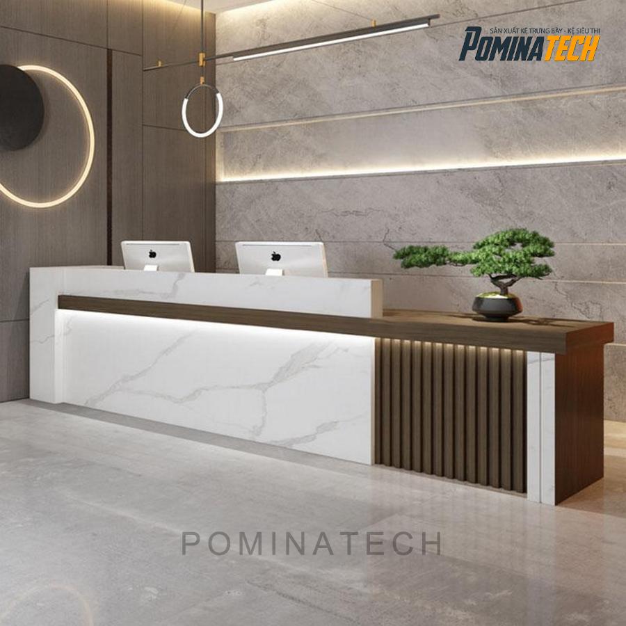 quay le tan sang trong Quầy Lễ Tân Sang Trọng Với Đèn LED Tạo Nét Độc Đáo Cho Không Gian